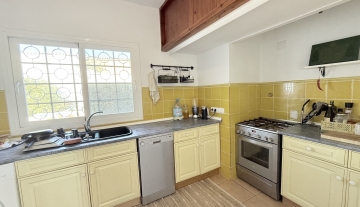 Resa estates ibiza for sale te koop villa huis zwembad san jose kitchen 3.jpeg